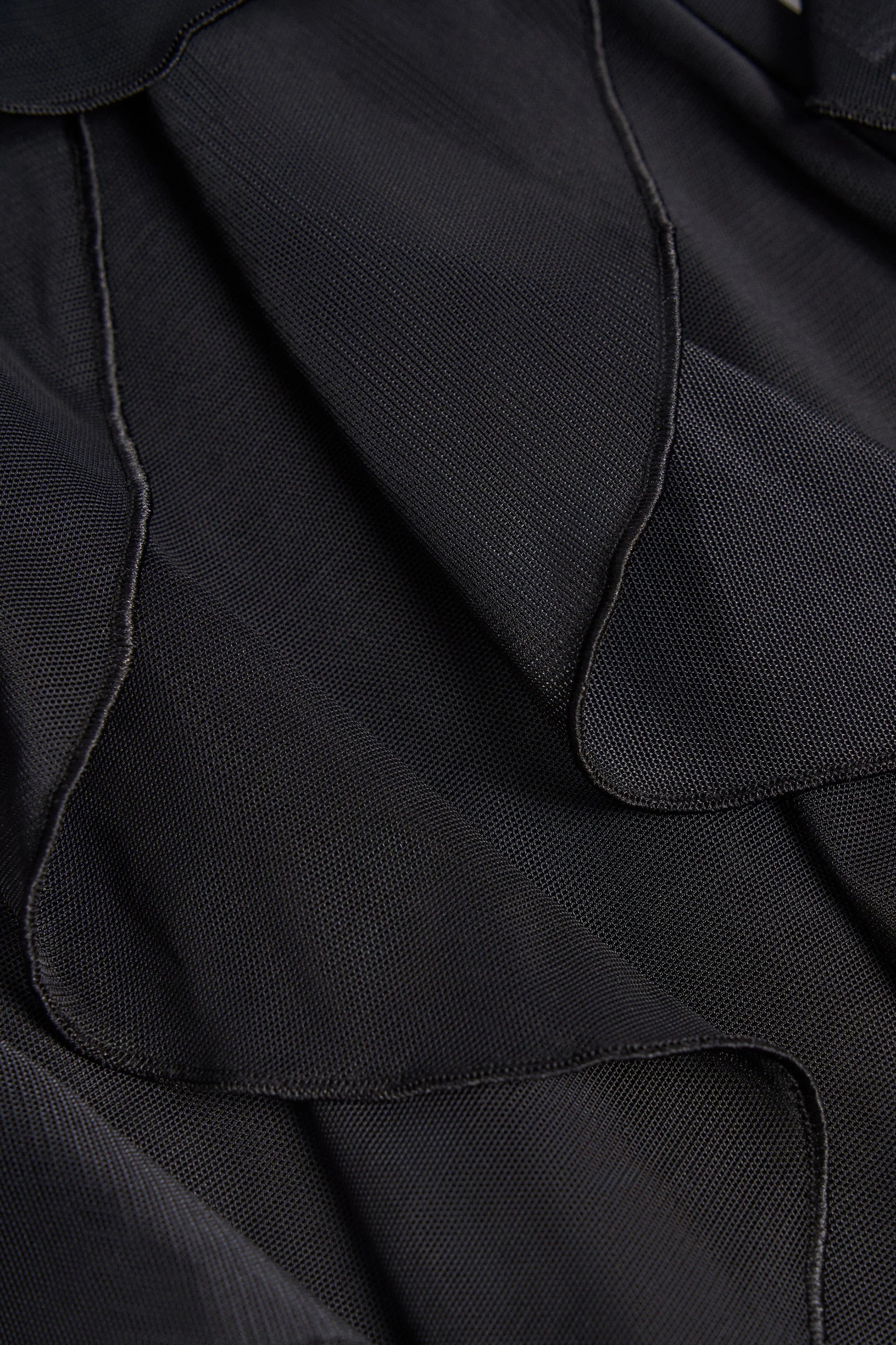 Ruffled Mid-Rise Flared Trousers in Black