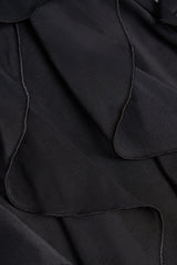 Ruffled Mid-Rise Flared Trousers in Black